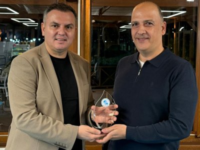 ÜYEMİZ ALPHAN ÜNAL’A MESLEKTE 25. YIL PLAKETİ VERİLDİ